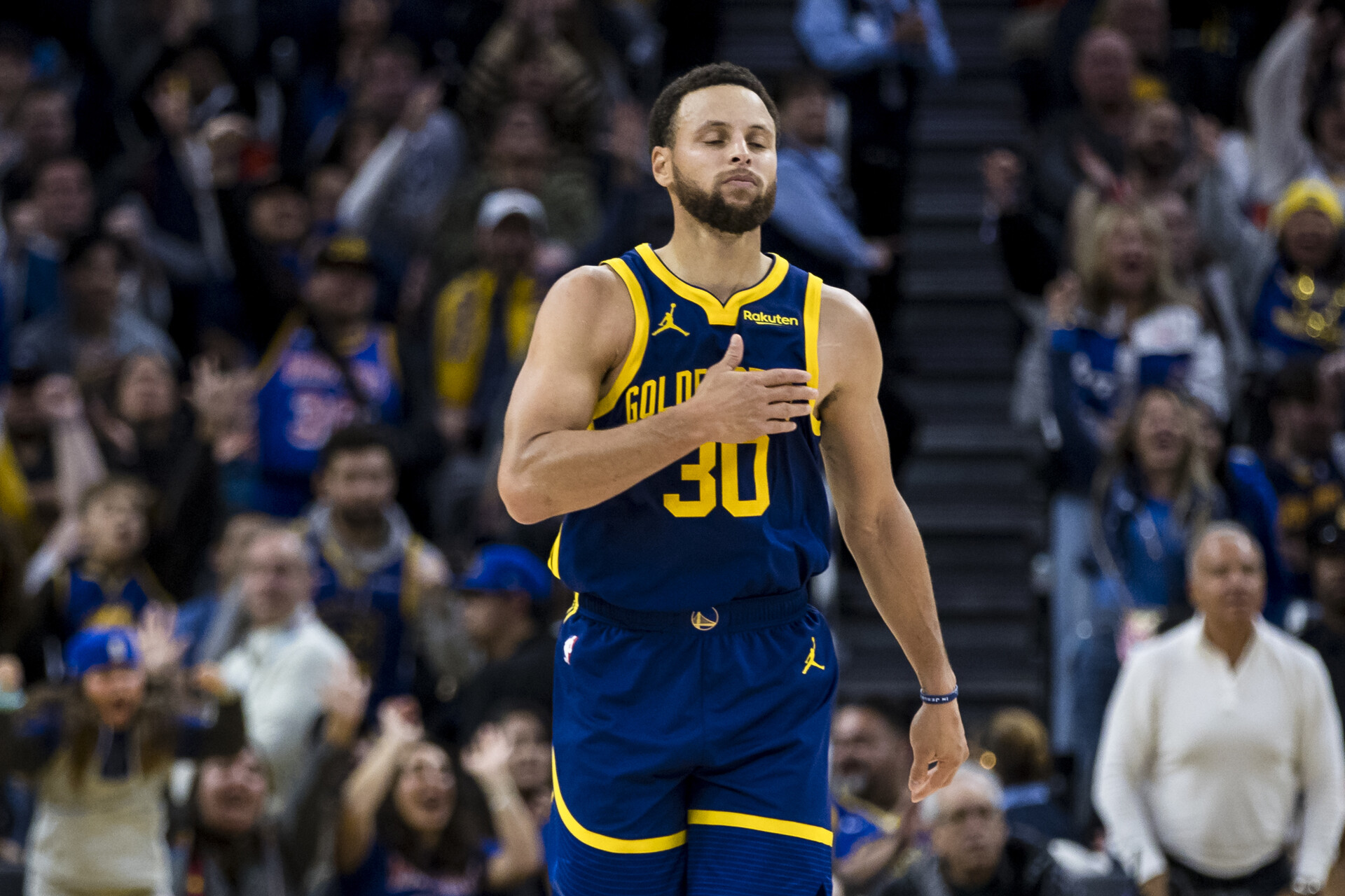 Nov 18, 2023; San Francisco, California, USA; Golden State Warriors guard Stephen Curry (30) reacts after scoring against the Oklahoma City Thunder during the second half at Chase Center.