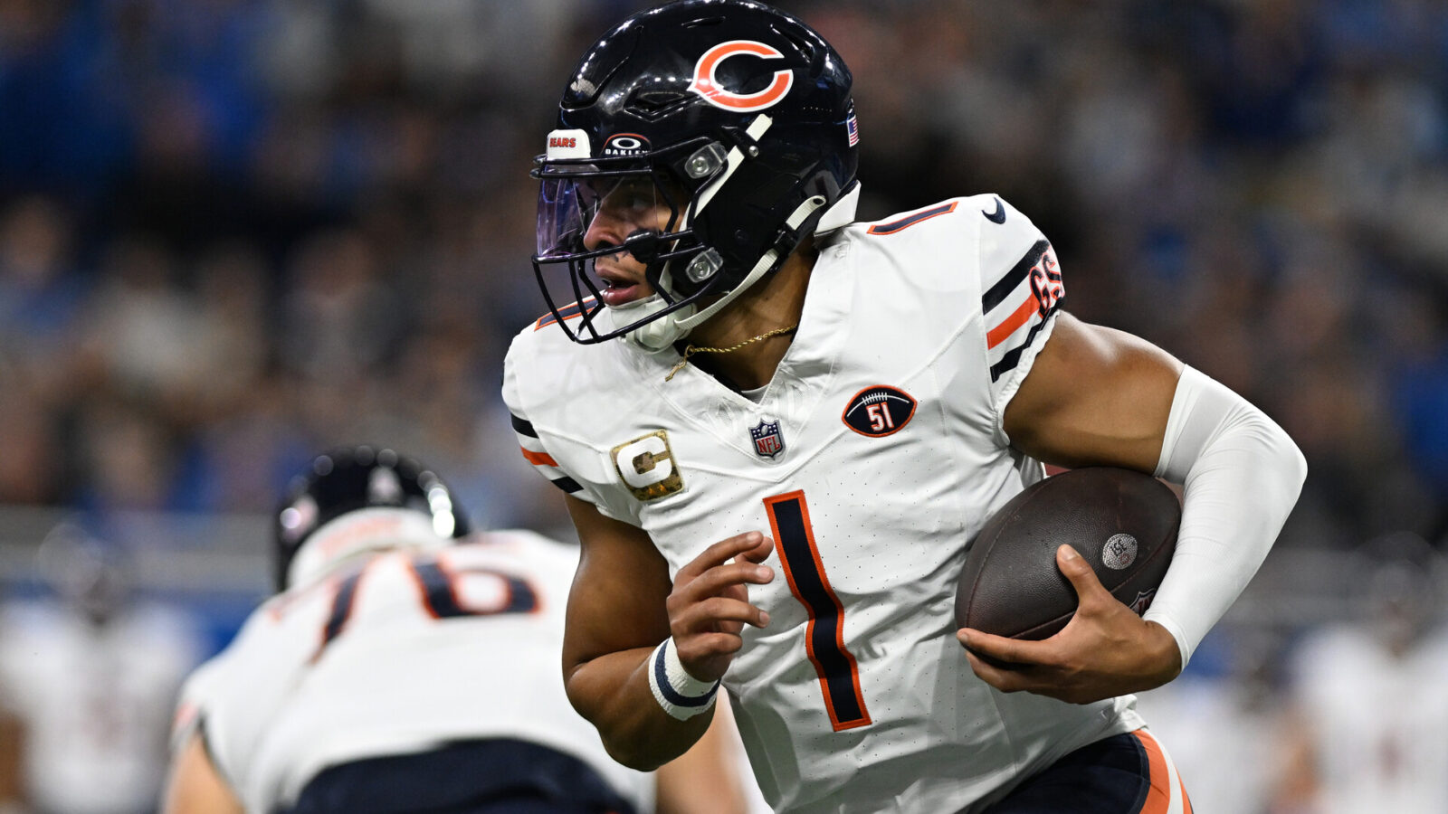Nov 19, 2023; Detroit, Michigan, USA; Chicago Bears quarterback Justin Fields (1) runs the ball against the Detroit Lions in the first quarter at Ford Field.