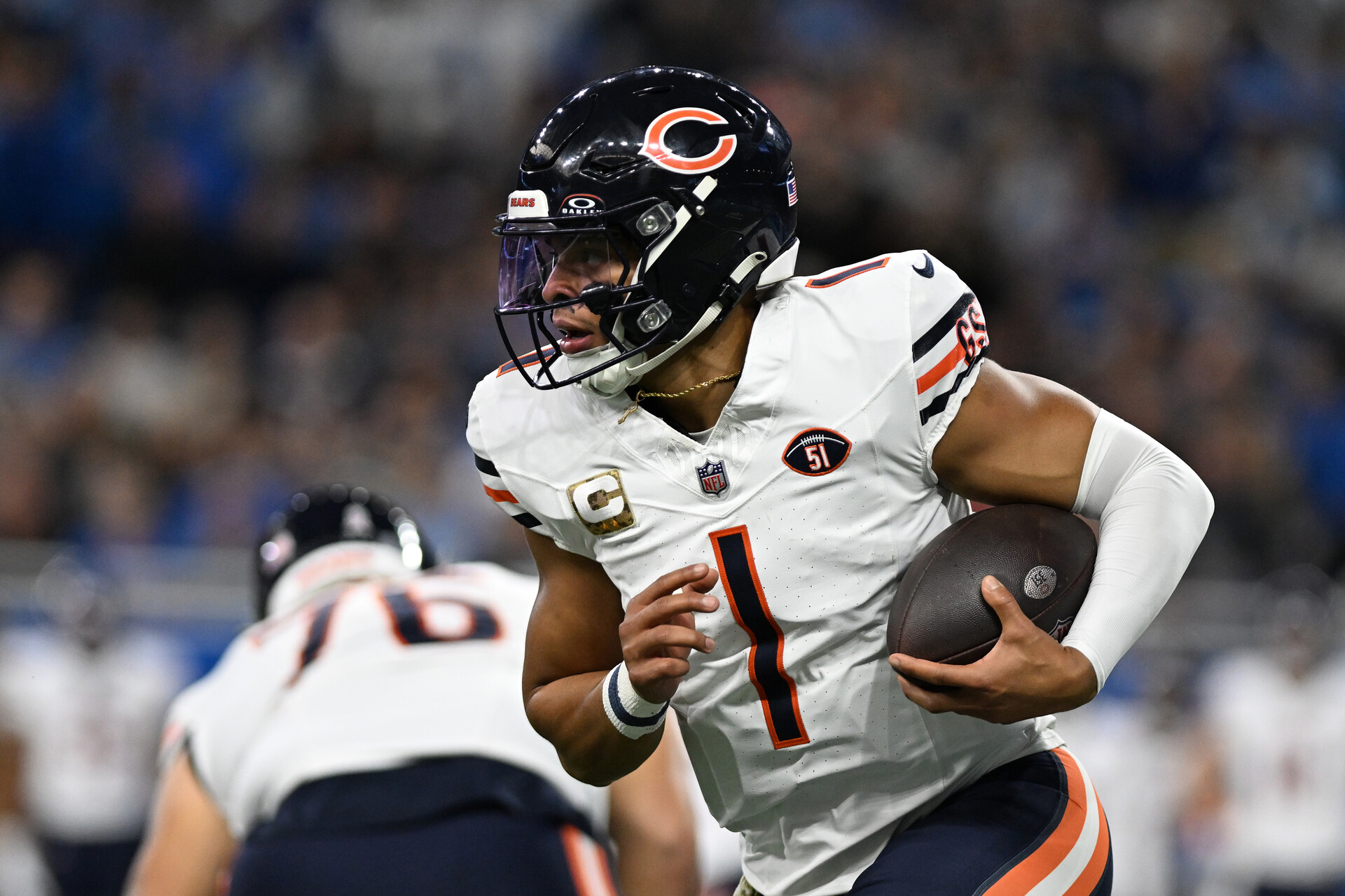 Nov 19, 2023; Detroit, Michigan, USA; Chicago Bears quarterback Justin Fields (1) runs the ball against the Detroit Lions in the first quarter at Ford Field.