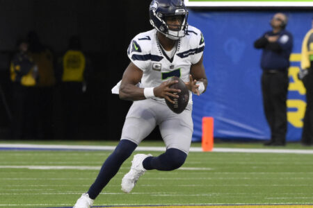 Nov 19, 2023; Inglewood, California, USA; Seattle Seahawks quarterback Geno Smith (7) controls the ball in the third quarter against the Los Angeles Rams at SoFi Stadium.