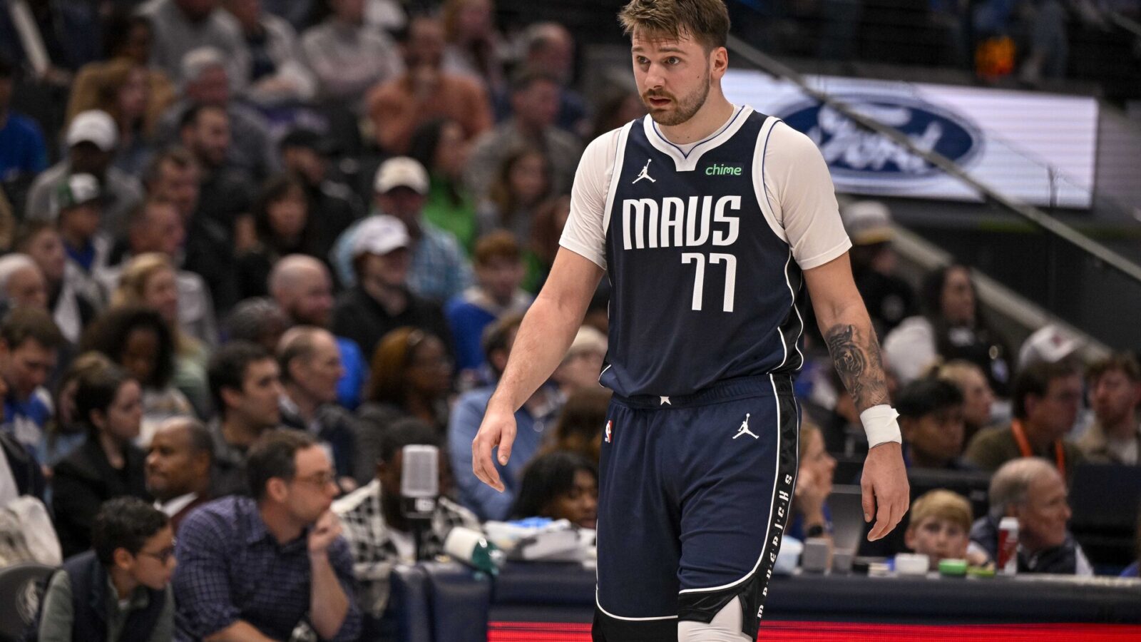 Nov 19, 2023; Dallas, Texas, USA; Dallas Mavericks guard Luka Doncic (77) walks back up the court during the second quarter against the Sacramento Kings at the American Airlines Center.