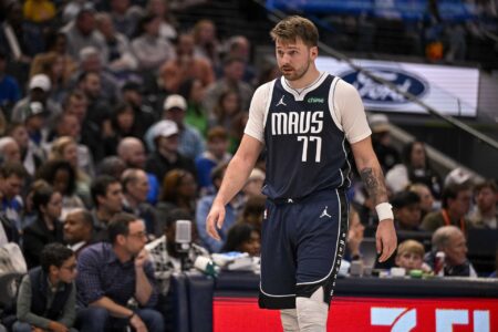 Nov 19, 2023; Dallas, Texas, USA; Dallas Mavericks guard Luka Doncic (77) walks back up the court during the second quarter against the Sacramento Kings at the American Airlines Center.