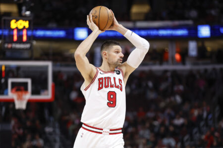 Nov 20, 2023; Chicago, Illinois, USA; Chicago Bulls center Nikola Vucevic (9) looks to pass the ball against the Miami Heat during the first half at United Center.