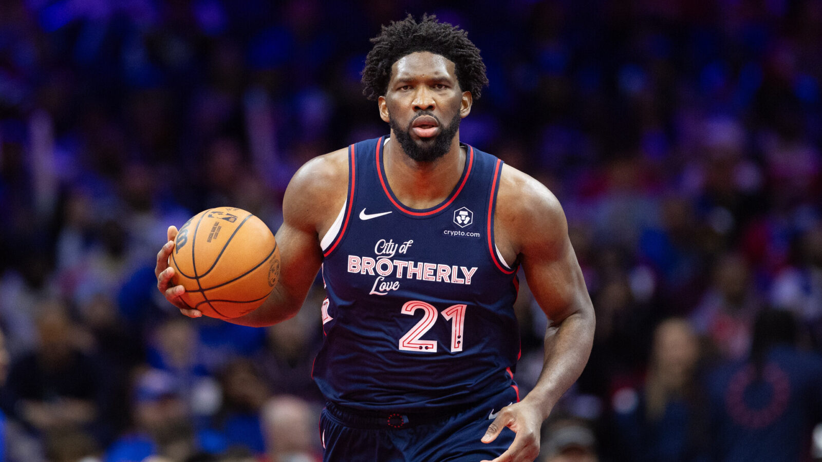 Nov 21, 2023; Philadelphia, Pennsylvania, USA; Philadelphia 76ers center Joel Embiid (21) dribbles the ball against the Cleveland Cavaliers during the fourth quarter at Wells Fargo Center.