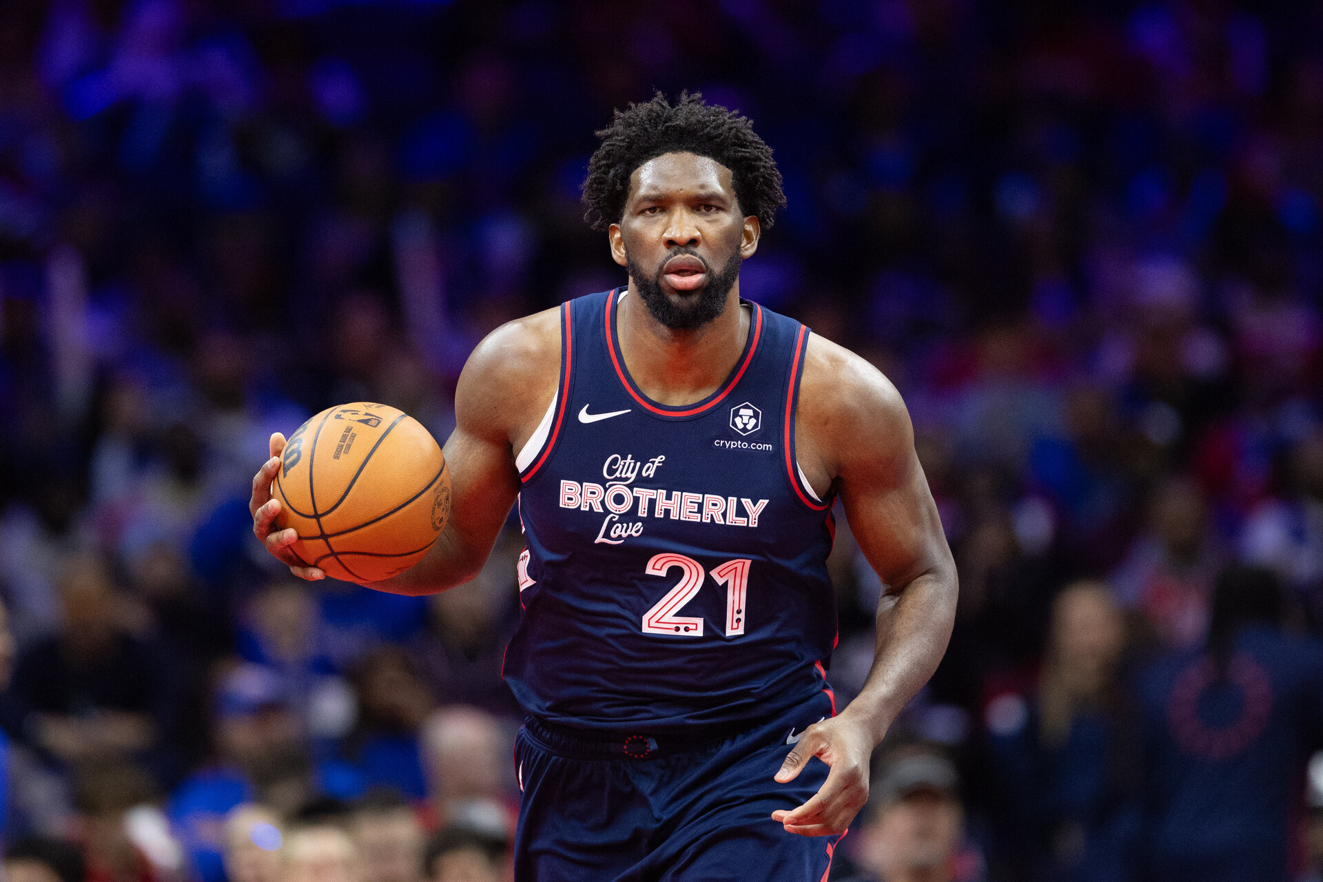Nov 21, 2023; Philadelphia, Pennsylvania, USA; Philadelphia 76ers center Joel Embiid (21) dribbles the ball against the Cleveland Cavaliers during the fourth quarter at Wells Fargo Center.