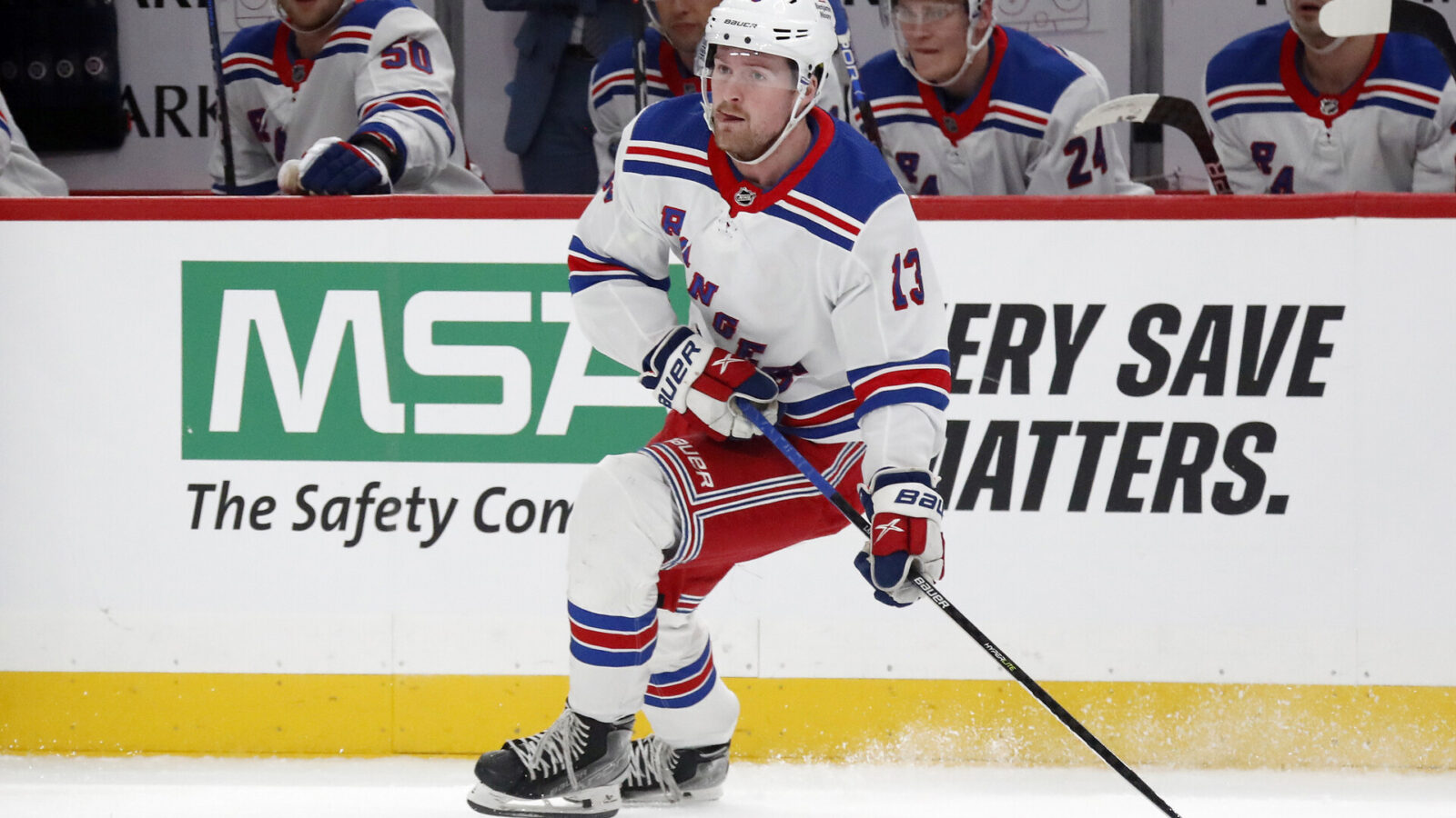Nov 22, 2023; Pittsburgh, Pennsylvania, USA; New York Rangers left wing Alexis Lafreniere (13) skates with the puck against the Pittsburgh Penguins during the first period at PPG Paints Arena.