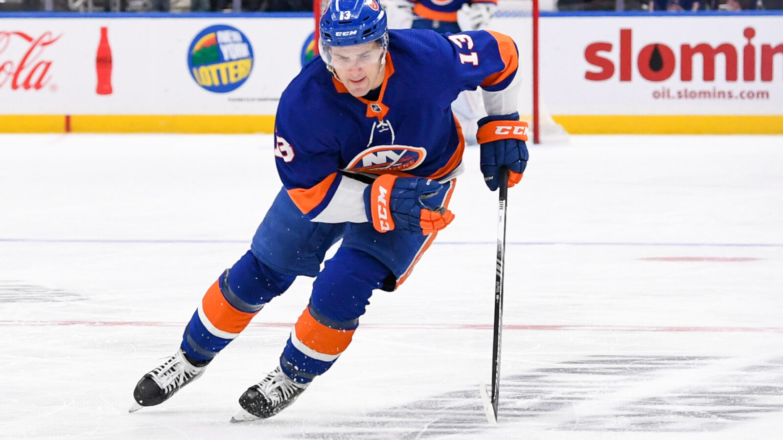 Nov 22, 2023; Elmont, New York, USA; New York Islanders center Mathew Barzal (13) skates across the blue line against the Philadelphia Flyers during the second period at UBS Arena.