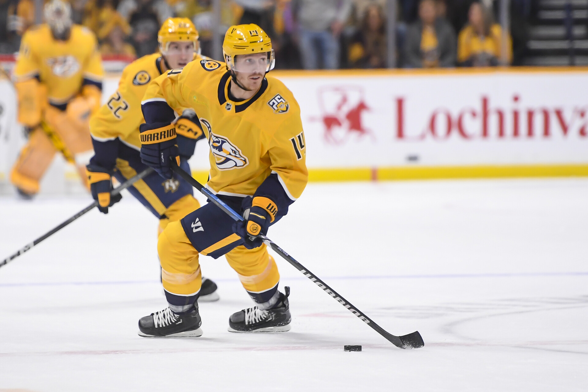 Nov 22, 2023; Nashville, Tennessee, USA; Nashville Predators left wing Gustav Nyquist (14) skates against the Calgary Flames during the first period at Bridgestone Arena.