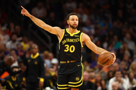 Nov 22, 2023; Phoenix, Arizona, USA; Golden State Warriors guard Stephen Curry (30) reacts against the Phoenix Suns in the first half at Footprint Center.