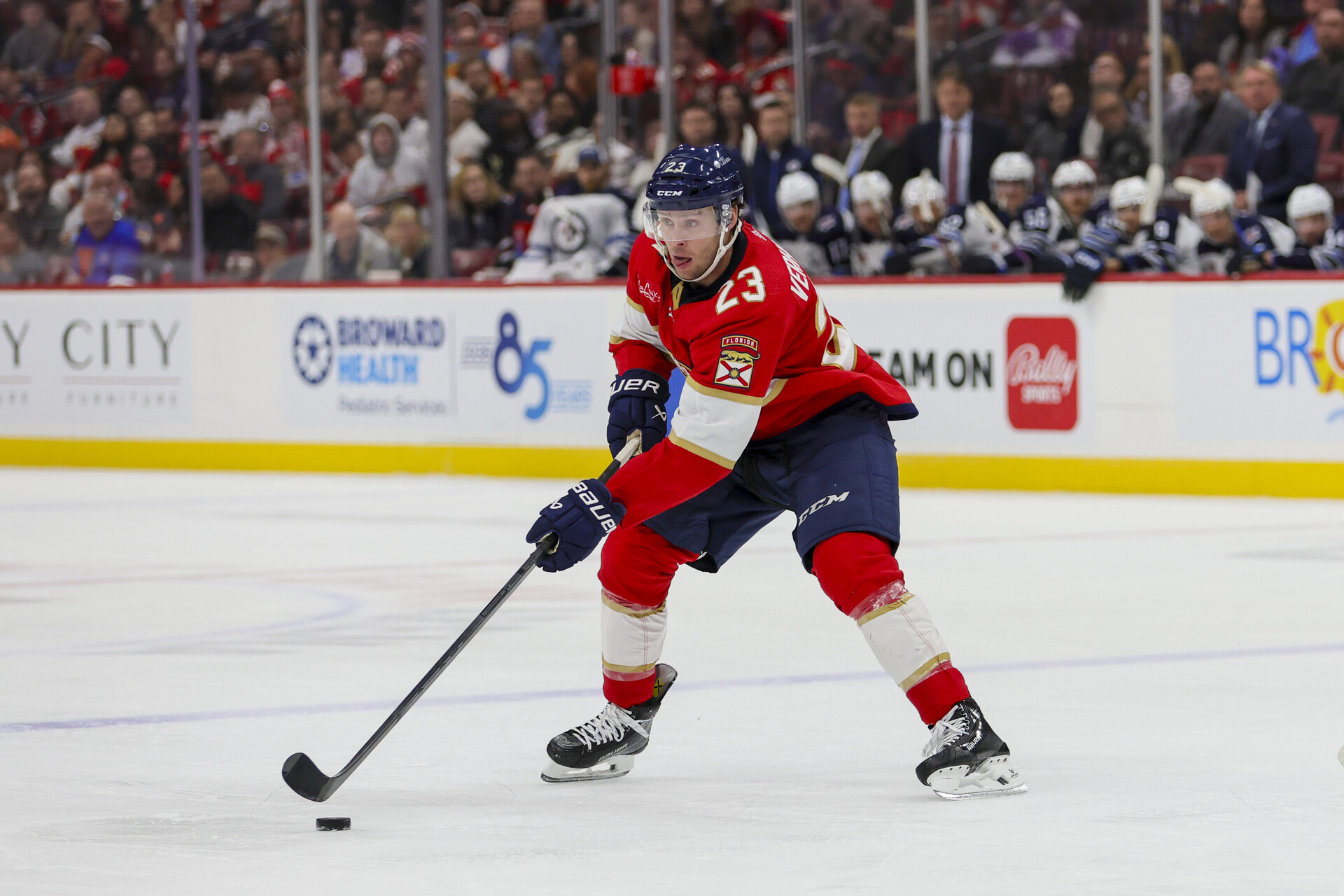 Nov 24, 2023; Sunrise, Florida, USA; Florida Panthers center Carter Verhaeghe (23) moves the puck against the Winnipeg Jets during the second period at Amerant Bank Arena.