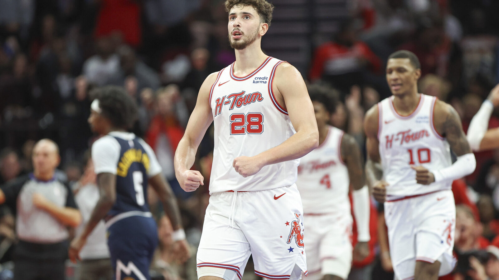 Nov 24, 2023; Houston, Texas, USA; Houston Rockets center Alperen Sengun (28) reacts after a play during the fourth quarter against the Denver Nuggets at Toyota Center.