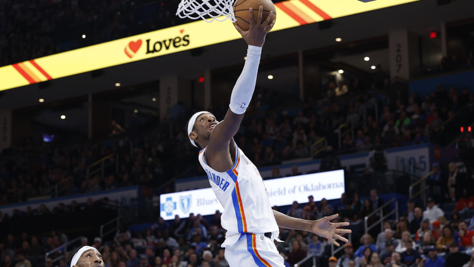 Nov 25, 2023; Oklahoma City, Oklahoma, USA; Oklahoma City Thunder guard Shai Gilgeous-Alexander (2) shoots against the Philadelphia 76ers during the second half at Paycom Center.