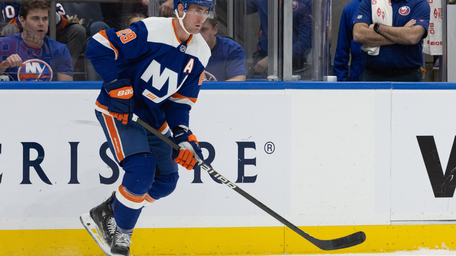 Nov 25, 2023; Elmont, New York, USA; New York Islanders center Brock Nelson (29) look to move the puck against the Philadelphia Flyers during the second period at UBS Arena.