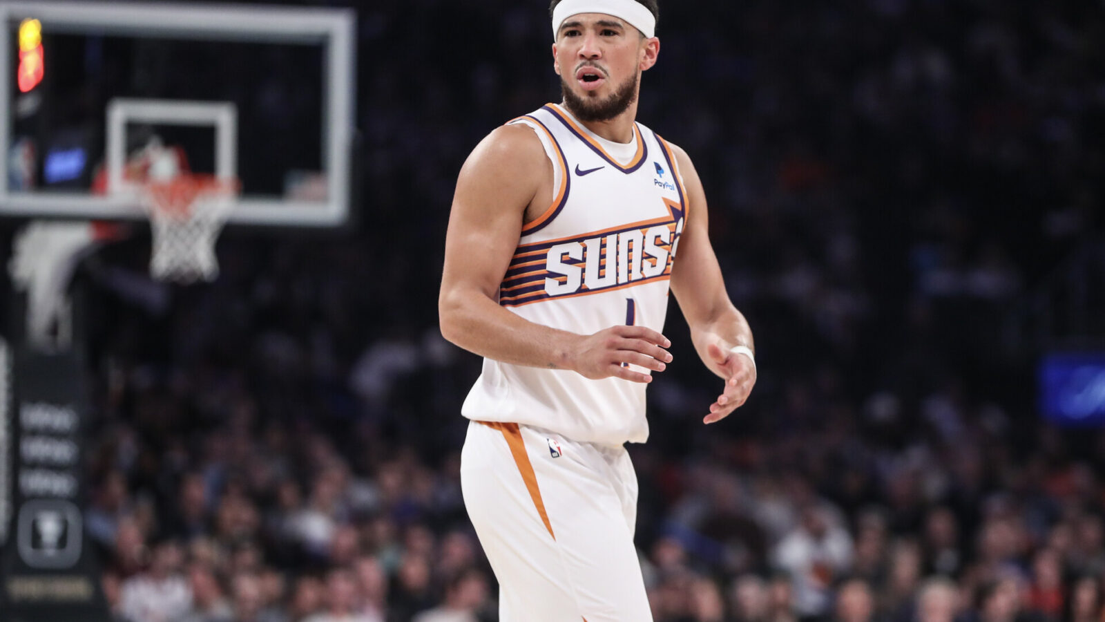 Nov 26, 2023; New York, New York, USA; Phoenix Suns guard Devin Booker (1) argues over a call in the first quarter against the New York Knicks at Madison Square Garden