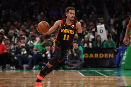 Nov 26, 2023; Boston, Massachusetts, USA; Atlanta Hawks guard Trae Young (11) brings the ball up the court against the Boston Celtics during the second quarter at TD Garden.