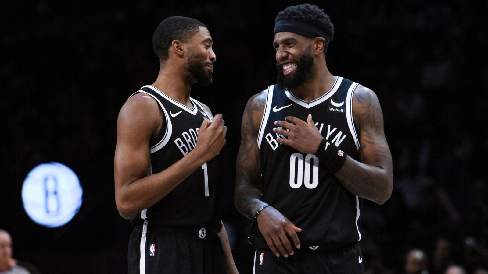 Nov 26, 2023; Brooklyn, New York, USA; Brooklyn Nets forward Mikal Bridges (1) and Brooklyn Nets forward Royce O'Neale (00) chat during a break in action during the third quarter against the Chicago Bulls at Barclays Center.