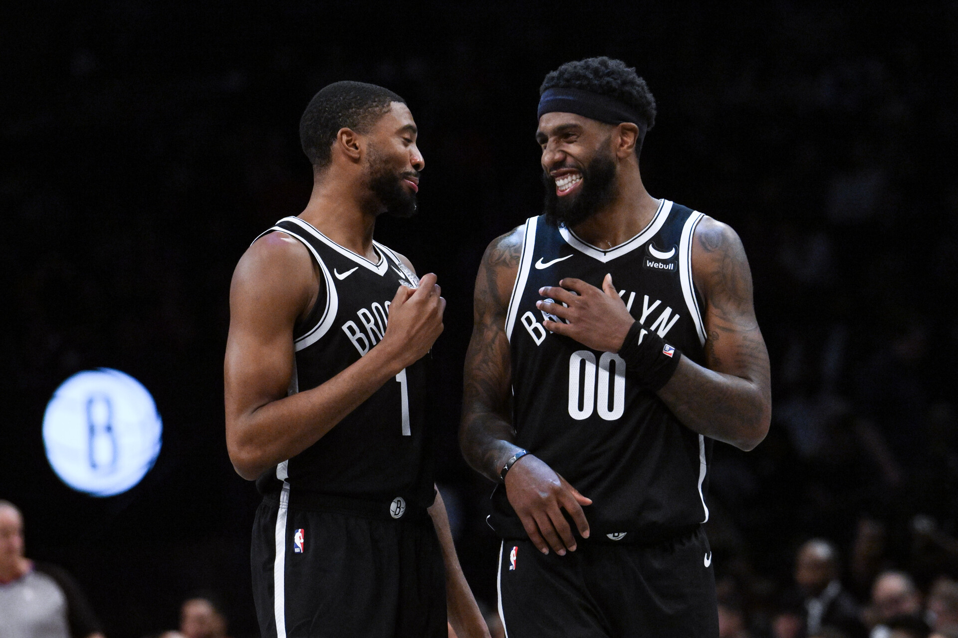 Nov 26, 2023; Brooklyn, New York, USA; Brooklyn Nets forward Mikal Bridges (1) and Brooklyn Nets forward Royce O'Neale (00) chat during a break in action during the third quarter against the Chicago Bulls at Barclays Center.