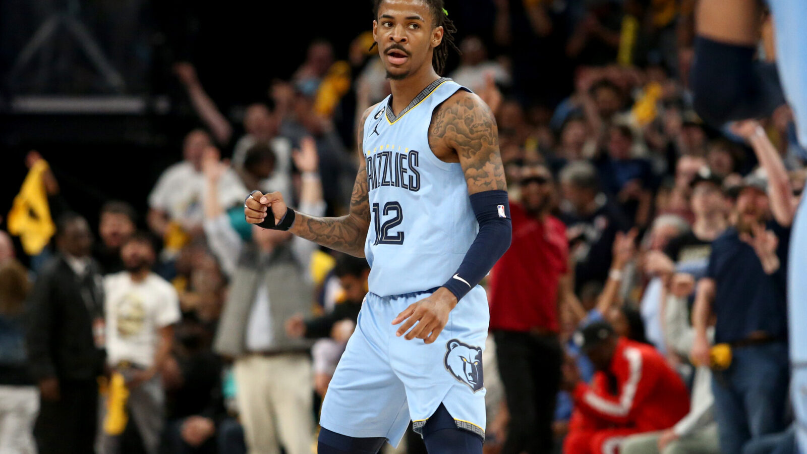 Apr 26, 2023; Memphis, Tennessee, USA; Memphis Grizzlies guard Ja Morant (12) reacts during the second half against the Los Angeles Lakers during game five of the 2023 NBA playoffs at FedExForum.