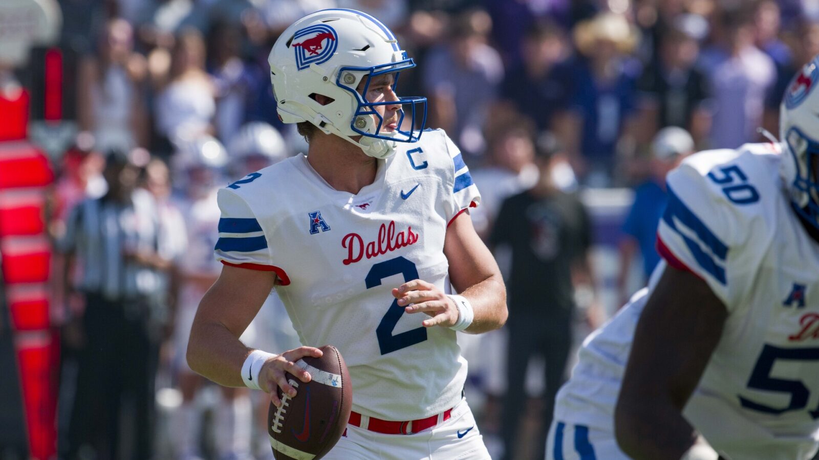Sep 23, 2023; Fort Worth, Texas, USA; SMU Mustangs quarterback Preston Stone (2) drops back to pass against the TCU Horned Frogs during the first half at Amon G. Carter Stadium.