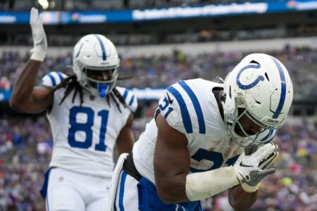 Indianapolis Colts running back Zack Moss (21) takes a bow after scoring a second quarter touchdown on Sunday, Sept. 24, 2023, at M&T Bank Stadium in Baltimore.