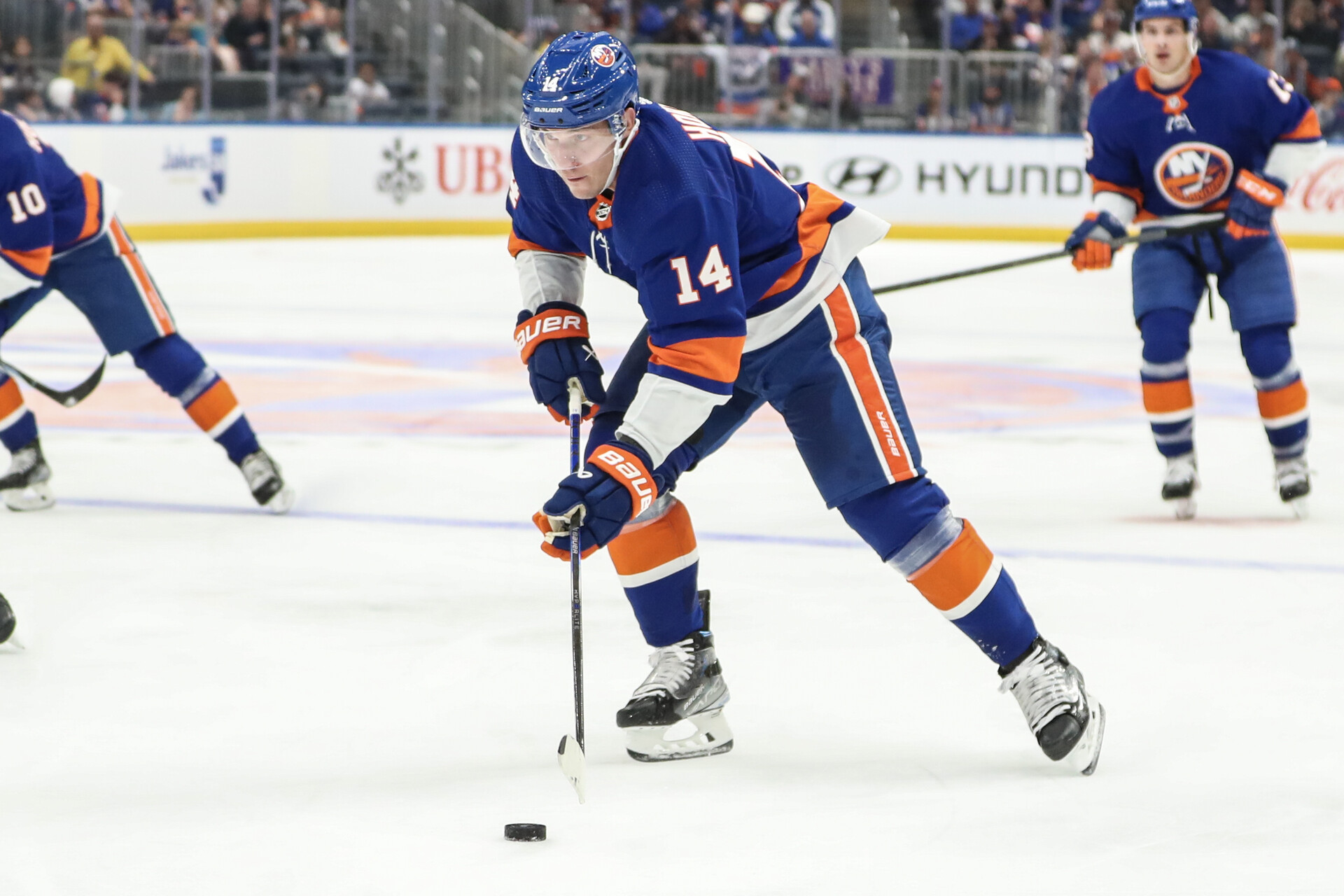 Oct 14, 2023; Elmont, New York, USA; New York Islanders center Bo Horvat (14) controls the puck in the second period against the Buffalo Sabres at UBS Arena.