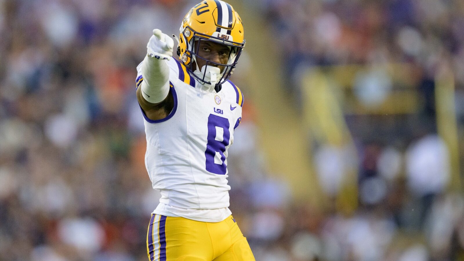 LSU Tigers wide receiver Malik Nabers (8) celebrates a run after a reception against the Auburn Tigers during the first quarter at Tiger Stadium.