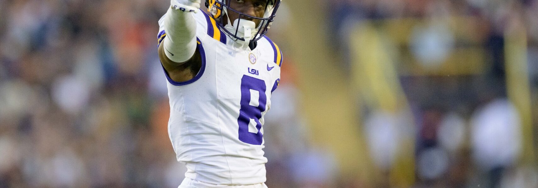 LSU Tigers wide receiver Malik Nabers (8) celebrates a run after a reception against the Auburn Tigers during the first quarter at Tiger Stadium.