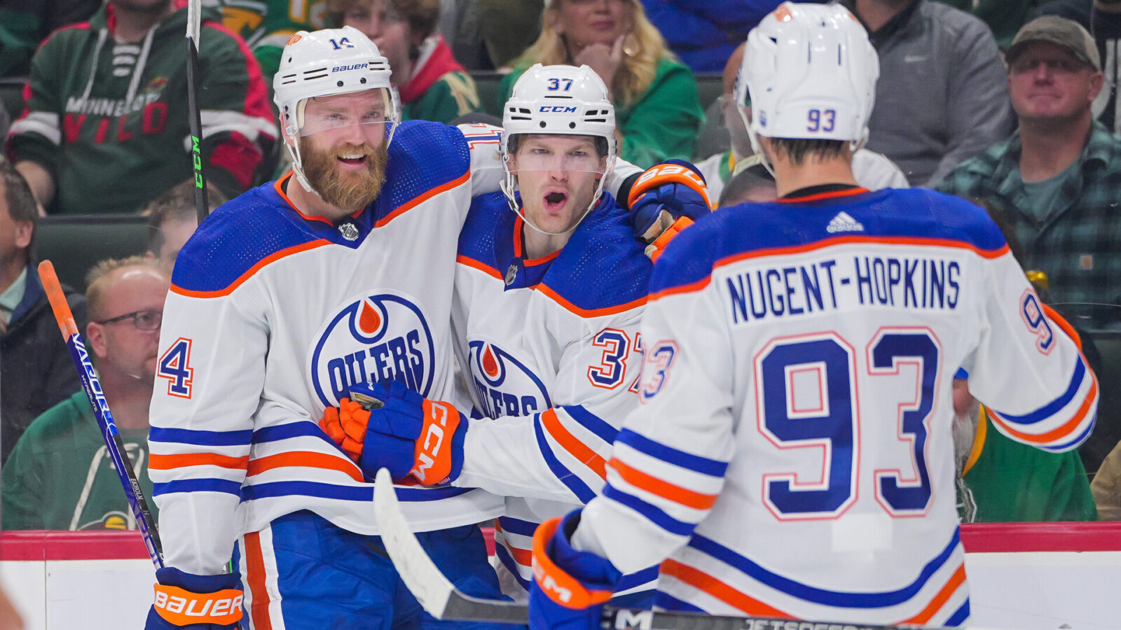 Oct 24, 2023; Saint Paul, Minnesota, USA; Edmonton Oilers left wing Warren Foegele (37) celebrates his goal with defenseman Mattias Ekholm (14) against the Minnesota Wild in the first period at Xcel Energy Center.