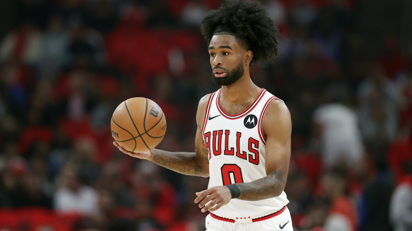 Chicago Bulls guard Coby White (0) brings the ball up court against the Oklahoma City Thunder during the first half of a basketball game at United Center.