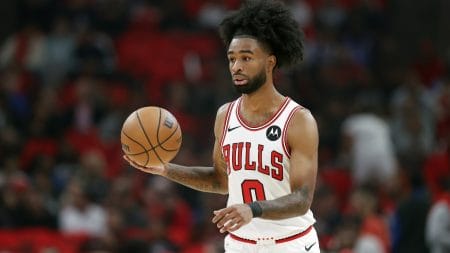 Chicago Bulls guard Coby White (0) brings the ball up court against the Oklahoma City Thunder during the first half of a basketball game at United Center.
