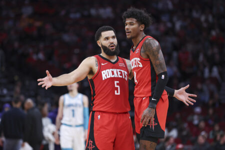 Houston Rockets guard Fred VanVleet (5) reacts with guard Jalen Green (4) during the fourth quarter against the Charlotte Hornets at Toyota Center.