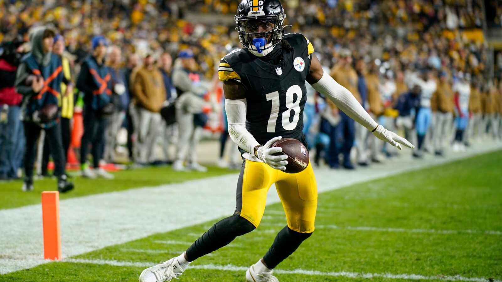 Pittsburgh Steelers wide receiver Diontae Johnson (18) scores a touchdown against the Tennessee Titans during the fourth quarter in Pittsburgh, Pa., Thursday, Nov. 2, 2023.