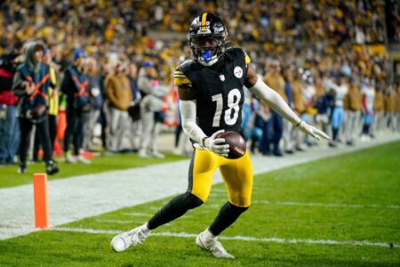 Pittsburgh Steelers wide receiver Diontae Johnson (18) scores a touchdown against the Tennessee Titans during the fourth quarter in Pittsburgh, Pa., Thursday, Nov. 2, 2023.