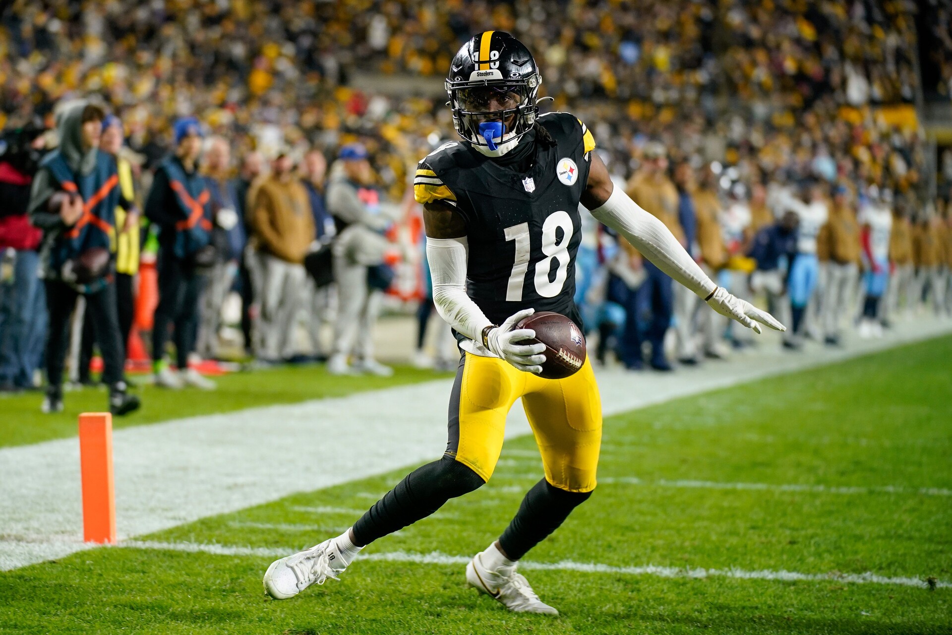 Pittsburgh Steelers wide receiver Diontae Johnson (18) scores a touchdown against the Tennessee Titans during the fourth quarter in Pittsburgh, Pa., Thursday, Nov. 2, 2023.