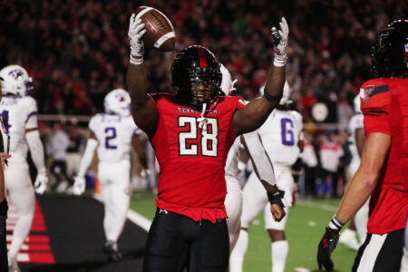 Nov 2, 2023; Lubbock, Texas, USA; Texas Tech Red Raiders running back Tahj Brooks (28) reacts after scoring a touchdown against the Texas Christian Horned Frogs in the second half at Jones AT&T Stadium and Cody Campbell Field.