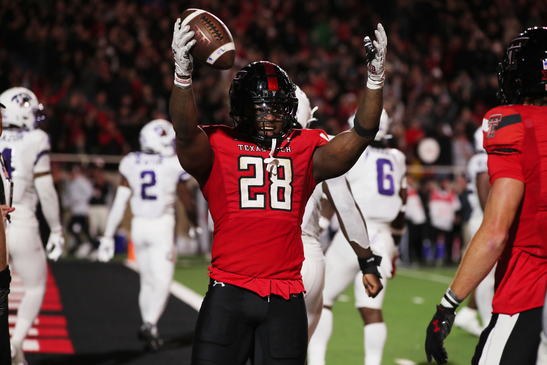 Nov 2, 2023; Lubbock, Texas, USA; Texas Tech Red Raiders running back Tahj Brooks (28) reacts after scoring a touchdown against the Texas Christian Horned Frogs in the second half at Jones AT&T Stadium and Cody Campbell Field.