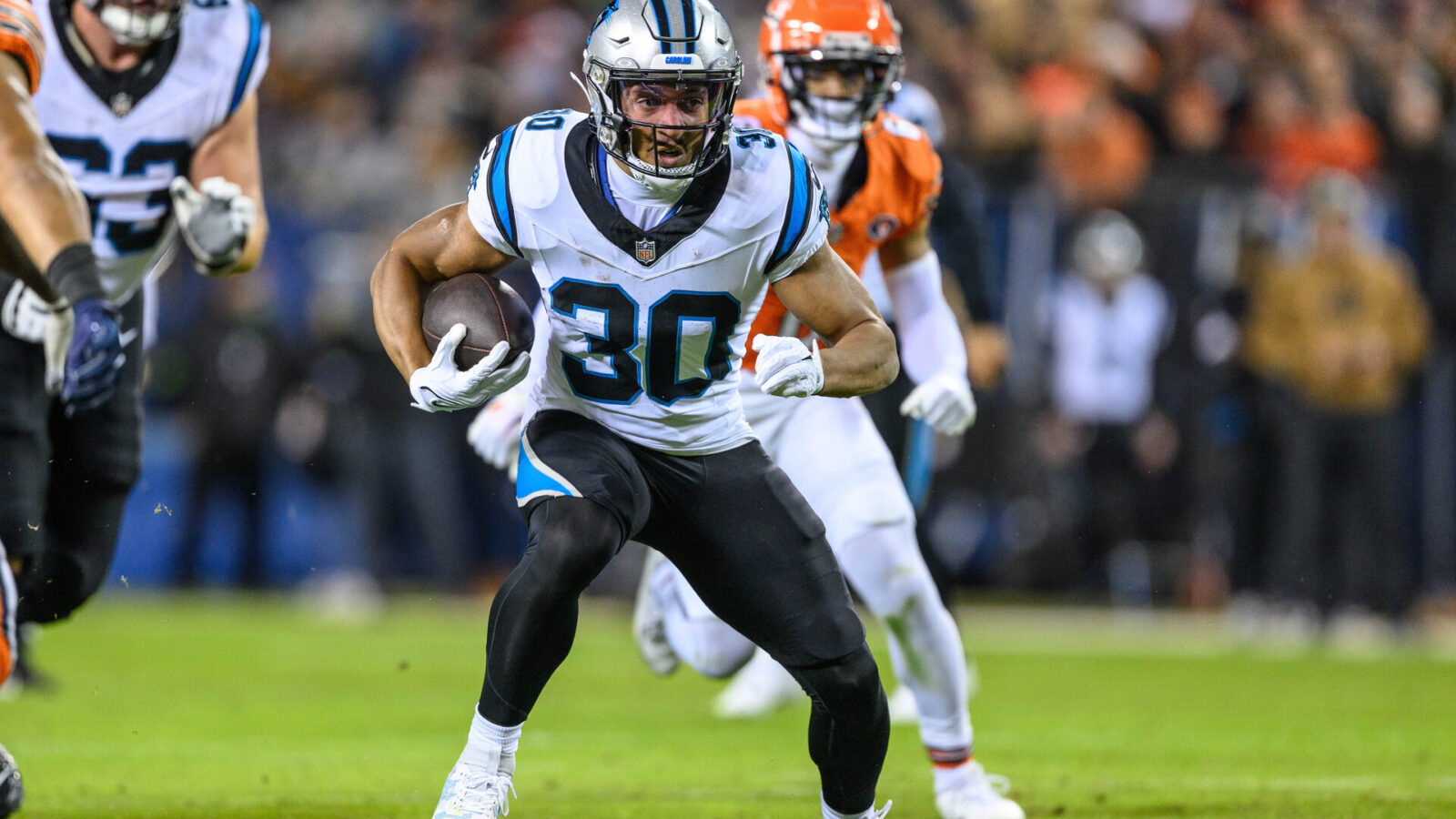 Nov 9, 2023; Chicago, Illinois, USA; Carolina Panthers running back Chuba Hubbard (30) runs the ball against the Chicago Bears during the first quarter at Soldier Field.