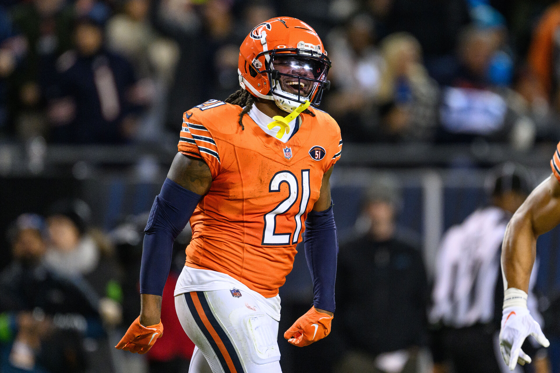 Nov 9, 2023; Chicago, Illinois, USA; Chicago Bears running back D'Onta Foreman (21) celebrates his rushing touchdown against the Carolina Panthers during the third quarter at Soldier Field.