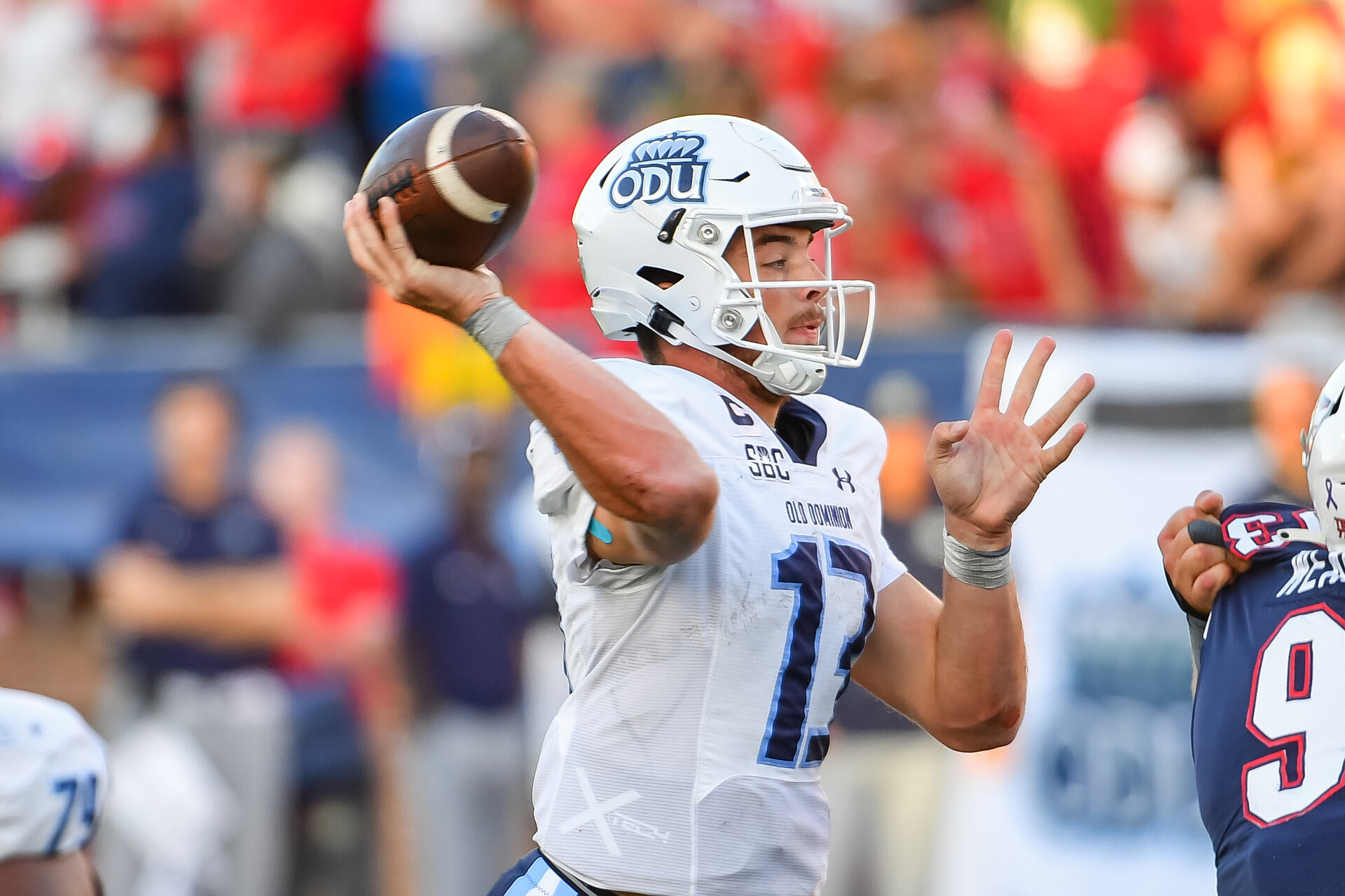 Old Dominion Monarchs quarterback Grant Wilson (13) throws a pass in the forth quarter at Williams Stadium.