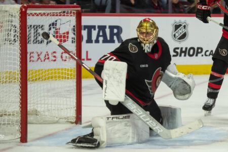 Nov 11, 2023; Ottawa, Ontario, CAN; Ottawa Senators goalie Joonas Korpisalo (70) makes a save in the second period against the Calgary Flames at the Canadian Tire Centre.