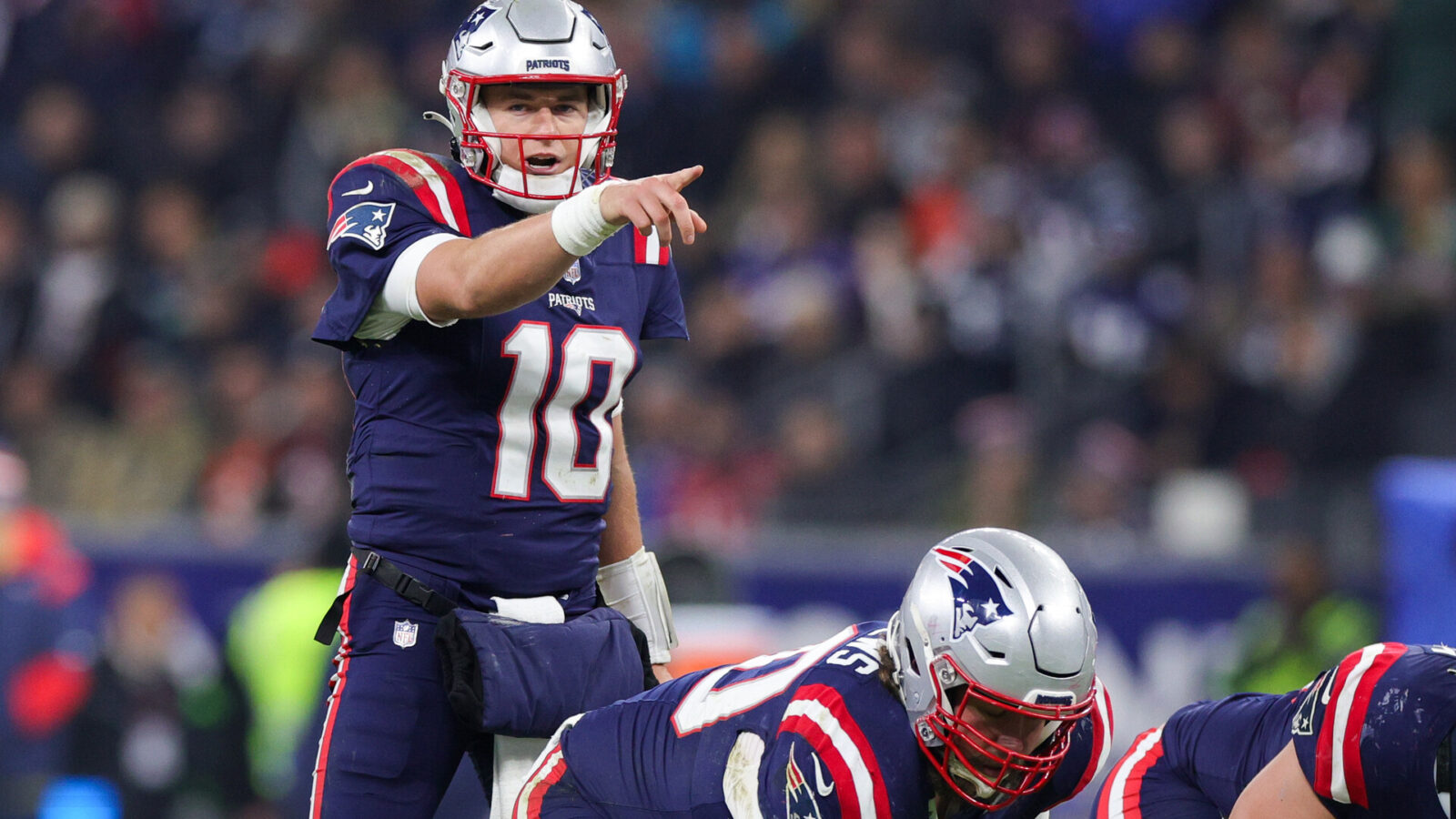 Nov 12, 2023; Frankfurt, Germany; New England Patriots quarterback Mac Jones (10) calls a play at the line against the Indianapolis Colts in the fourth quarter during an International Series game at Deutsche Bank Park.