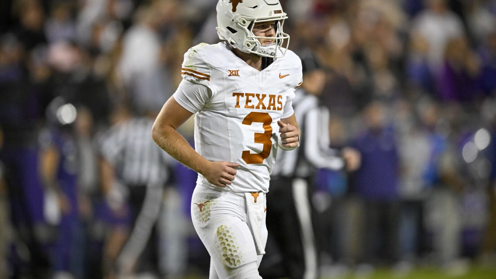 Nov 11, 2023; Fort Worth, Texas, USA; Texas Longhorns quarterback Quinn Ewers (3) in action during the game between the TCU Horned Frogs and the Texas Longhorns at Amon G. Carter Stadium.
