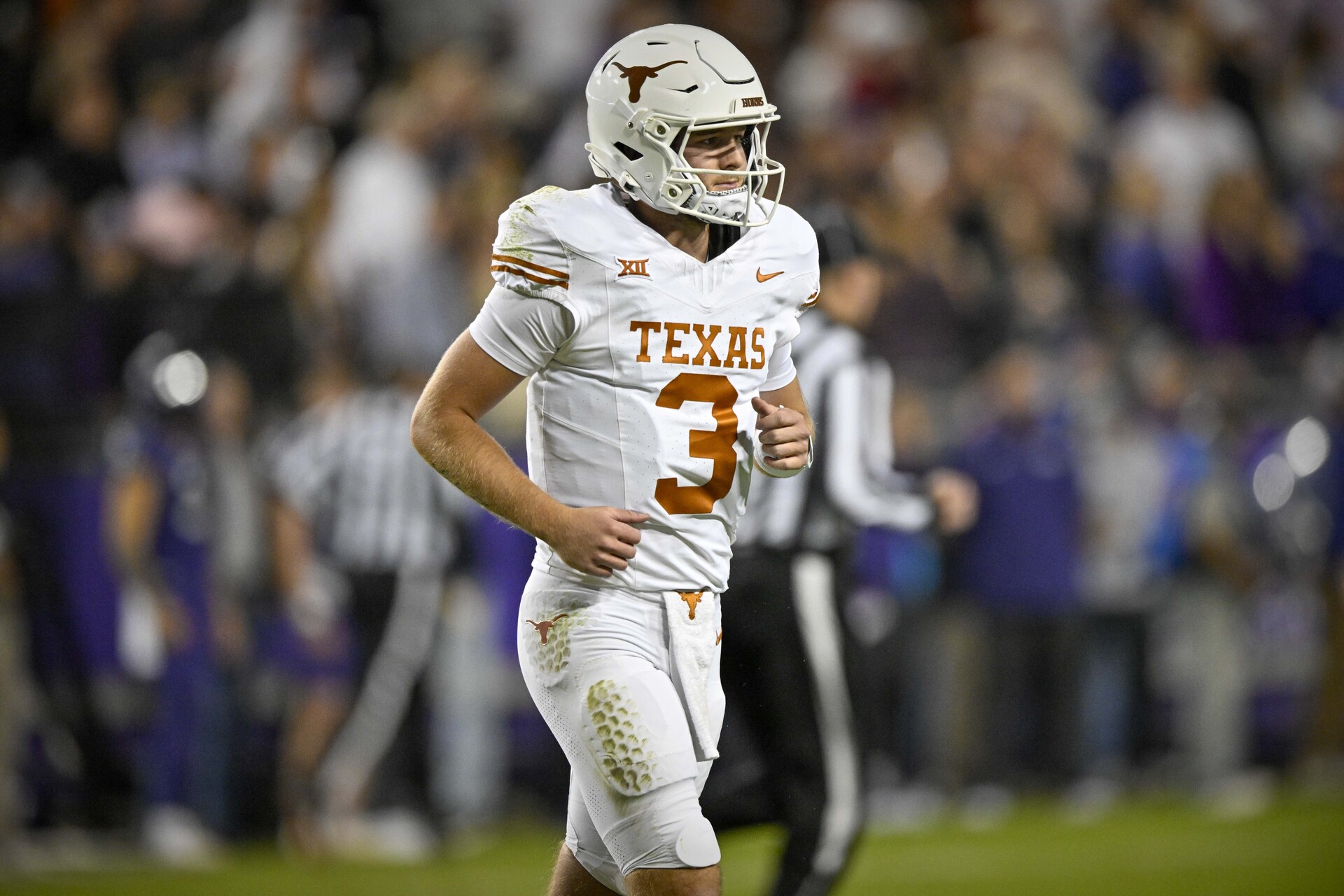 Nov 11, 2023; Fort Worth, Texas, USA; Texas Longhorns quarterback Quinn Ewers (3) in action during the game between the TCU Horned Frogs and the Texas Longhorns at Amon G. Carter Stadium.