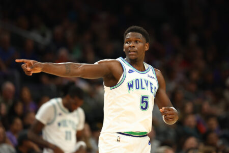 Nov 15, 2023; Phoenix, Arizona, USA; Minnesota Timberwolves guard Anthony Edwards (5) reacts against the Phoenix Suns in the first half at Footprint Center.