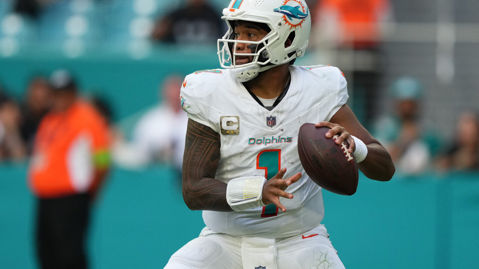 Nov 19, 2023; Miami Gardens, Florida, USA; Miami Dolphins quarterback Tua Tagovailoa (1) attempts a pass against the Las Vegas Raiders during the second half at Hard Rock Stadium.