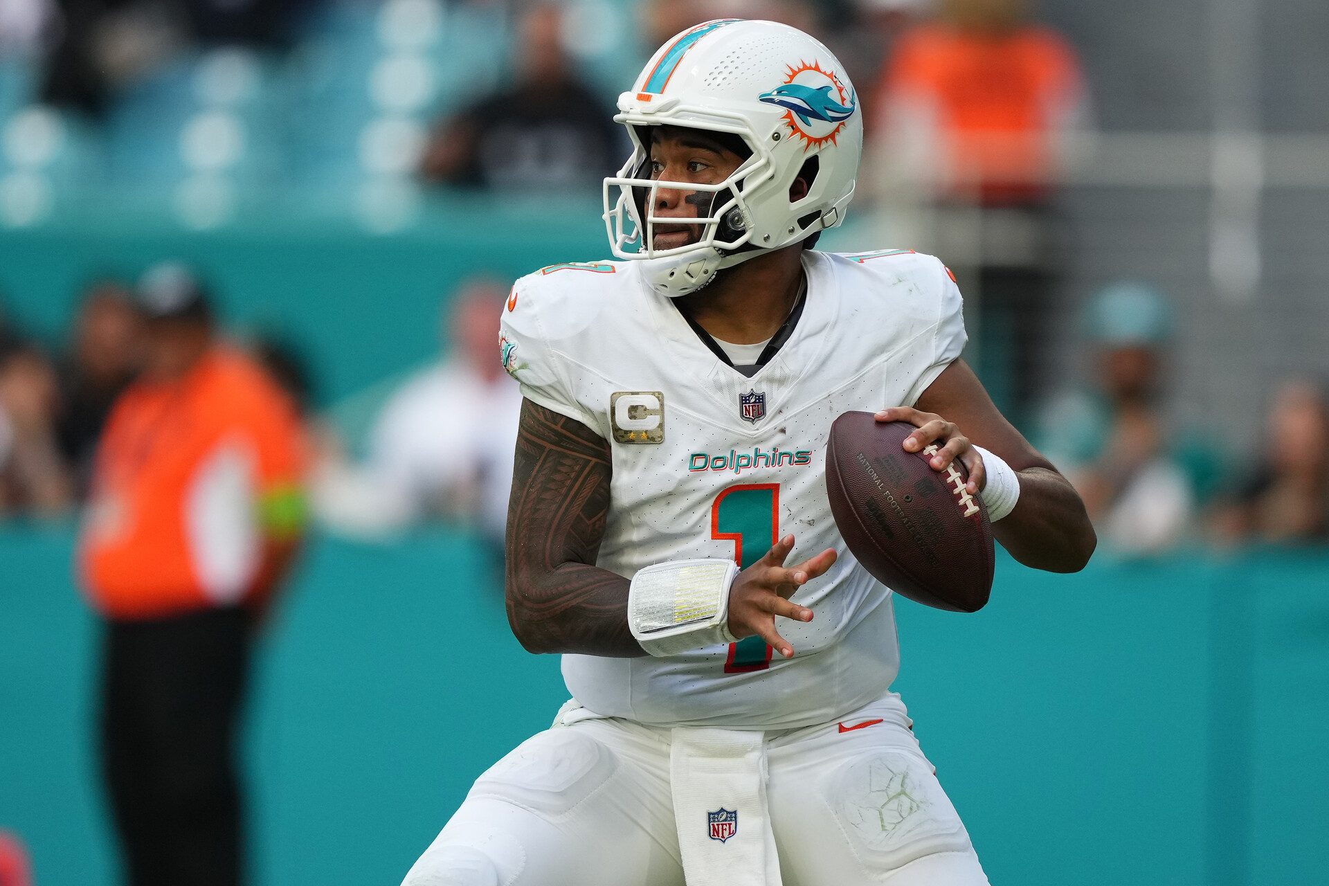 Nov 19, 2023; Miami Gardens, Florida, USA; Miami Dolphins quarterback Tua Tagovailoa (1) attempts a pass against the Las Vegas Raiders during the second half at Hard Rock Stadium.
