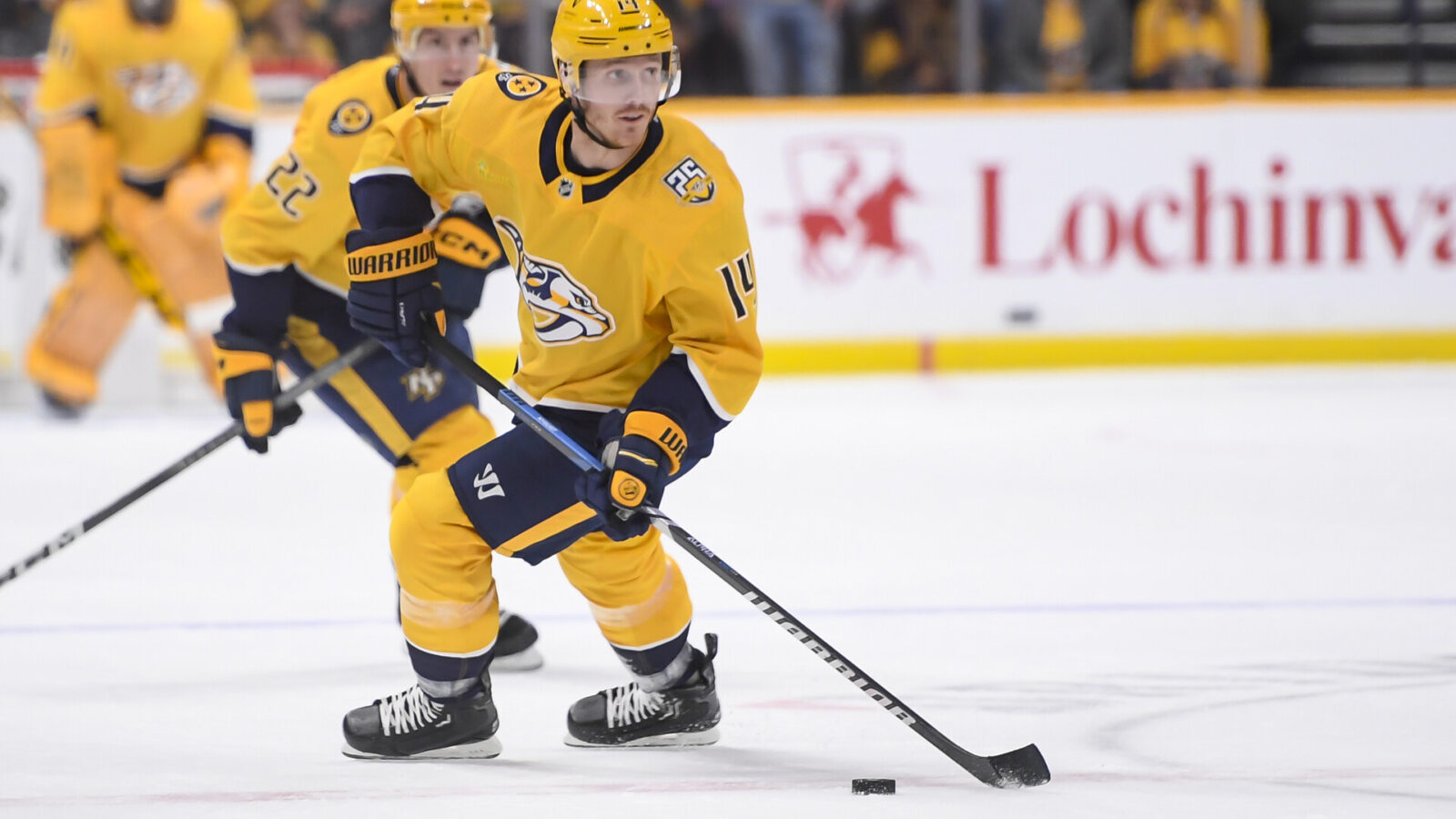 Nov 22, 2023; Nashville, Tennessee, USA; Nashville Predators left wing Gustav Nyquist (14) skates against the Calgary Flames during the first period at Bridgestone Arena.