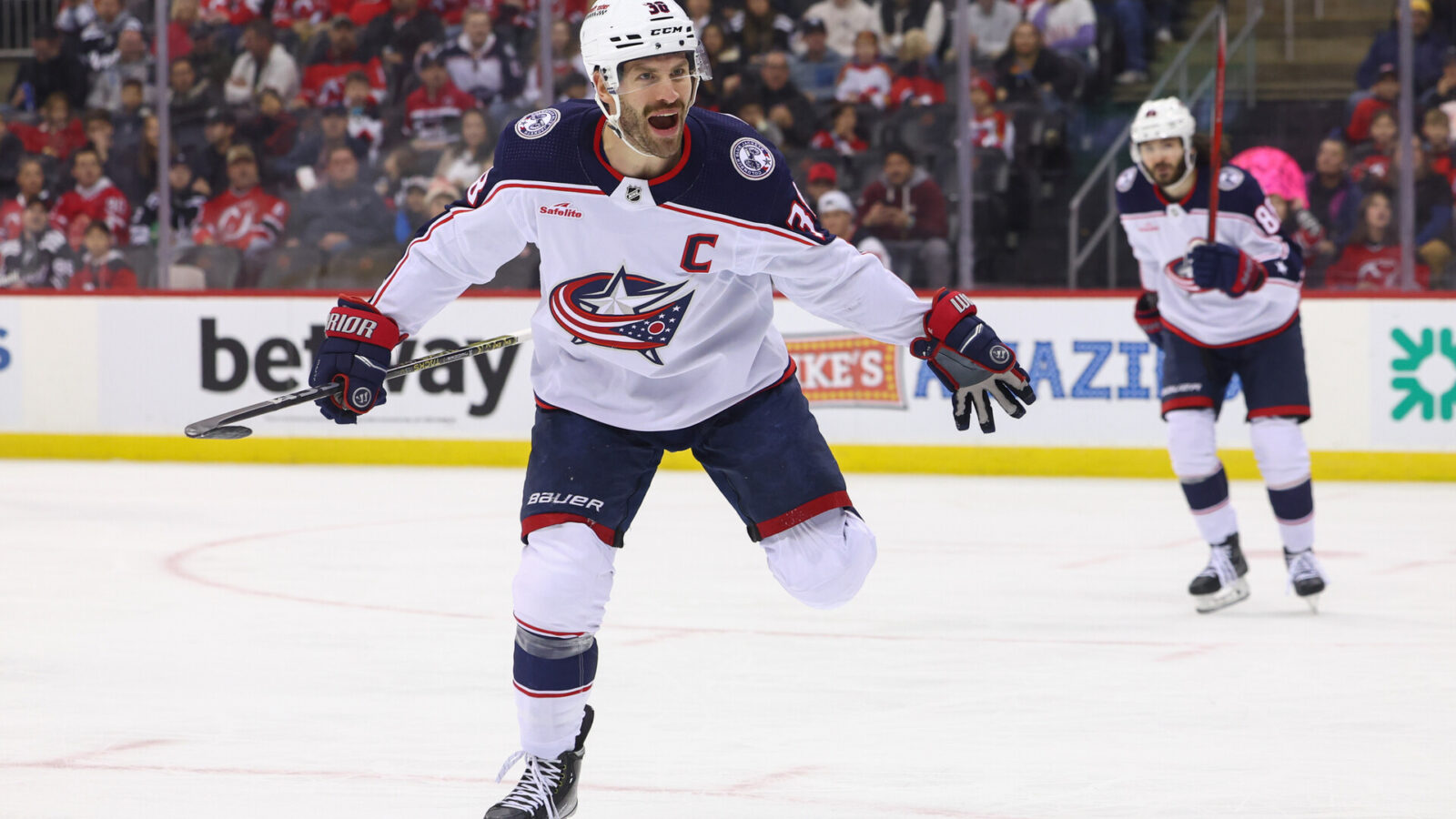 Nov 24, 2023; Newark, New Jersey, USA; Columbus Blue Jackets center Boone Jenner (38) celebrates his goal against the New Jersey Devils during the first period at Prudential Center.
