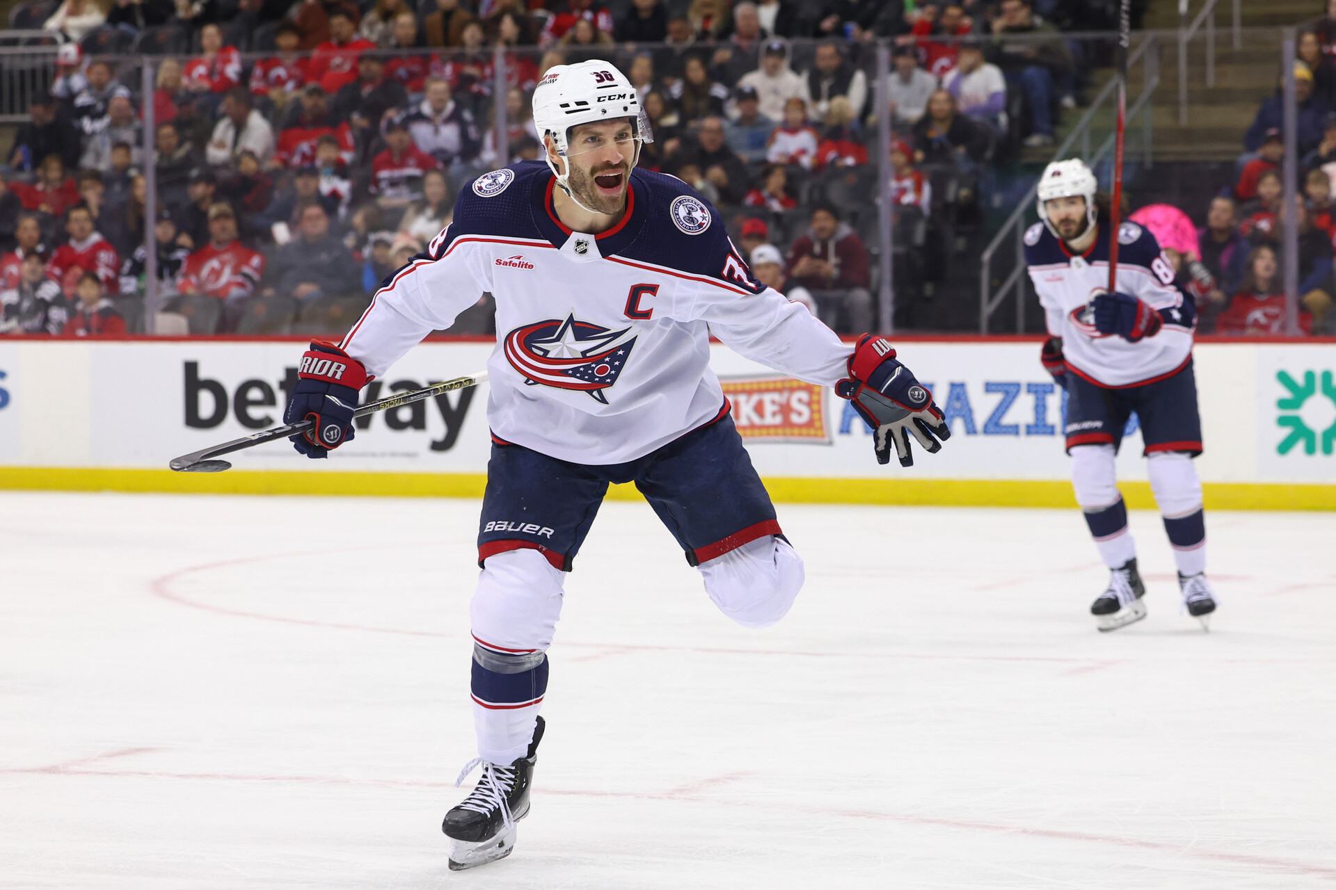Nov 24, 2023; Newark, New Jersey, USA; Columbus Blue Jackets center Boone Jenner (38) celebrates his goal against the New Jersey Devils during the first period at Prudential Center.