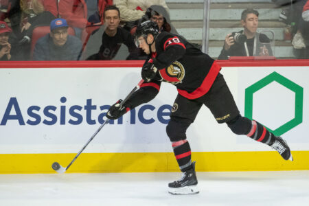 Nov 24 2023; Ottawa, Ontario, CAN; Ottawa Senators right wing Drake Batherson (19) shoots the puck in the third period againstthe New York Islanders at the Canadian Tire Centre.